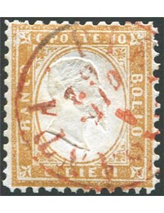 1862 - Vittorio Emanuele 10 c. bistro giallastro dent. 11½x12 con annullo di Pietrasanta (LU) in rosso (R1 su Sardegna), cerchio