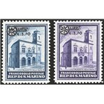 1934 - Palazzetto della posta 1,75 £ azzurro e 2,75 £ violetto con soprast. "L. 3,70" e fregio, serie n° 184/85. Cert.: IC. Cat.